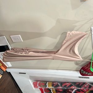 Beige dress with cutout in stomach area